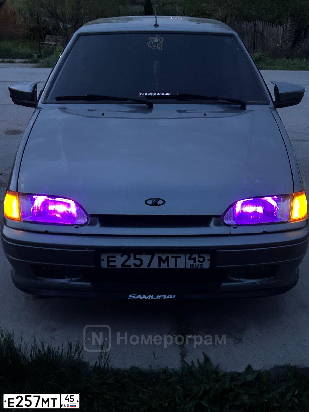 Фото автомобиля LADA 2114 SAMARA, 2010 — госномер Е257МТ45. Цвет: СЕРЫЙ