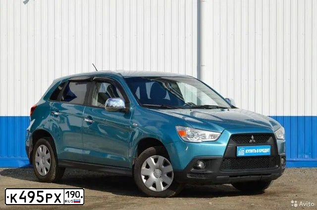 Фото автомобиля MITSUBISHI ASX, 2010 — госномер Р478МС70. Цвет: голубой