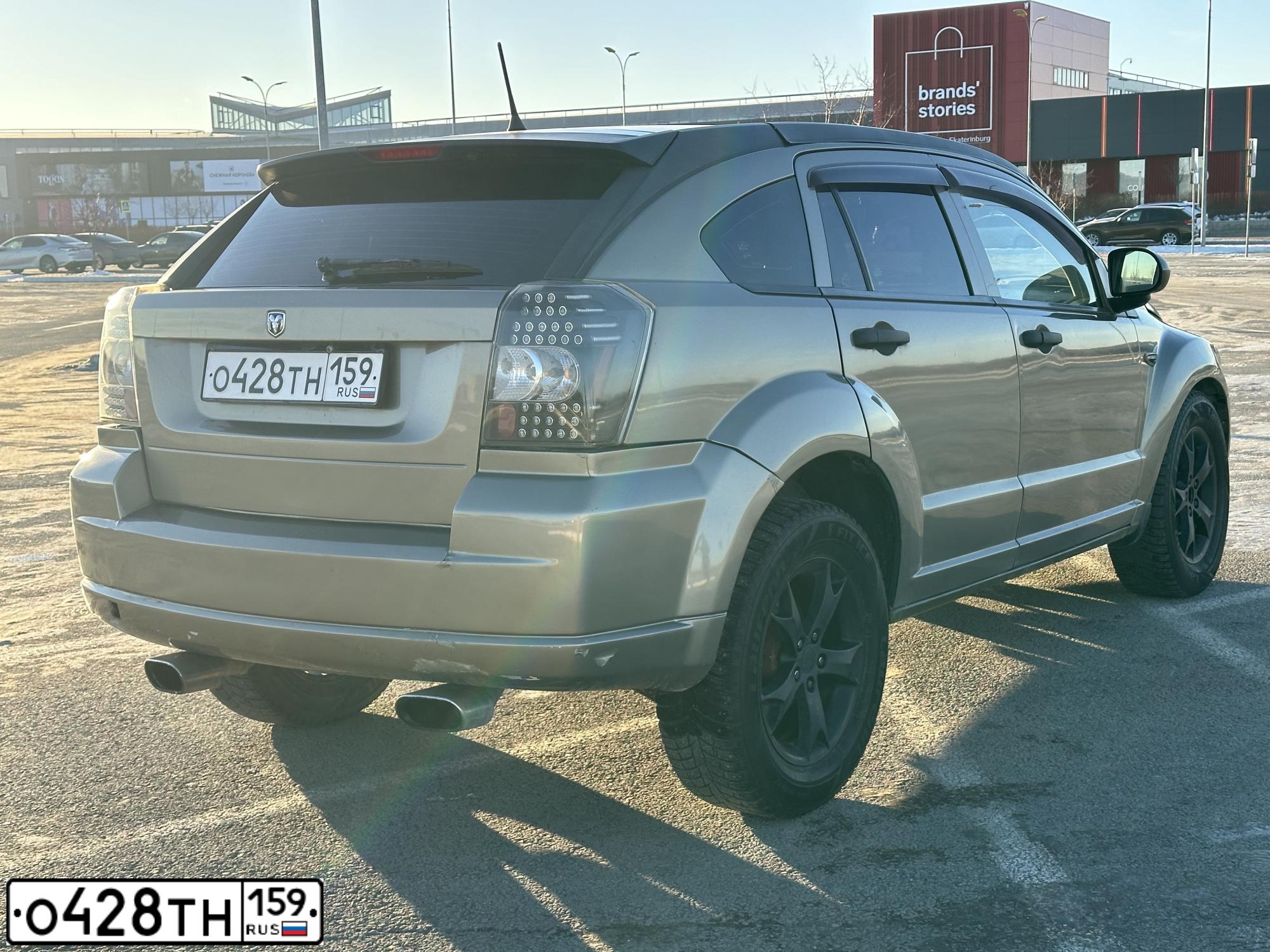 Фото автомобиля DODGE CALIBER, 2007 — госномер Х751МЕ196. Цвет: Хаки