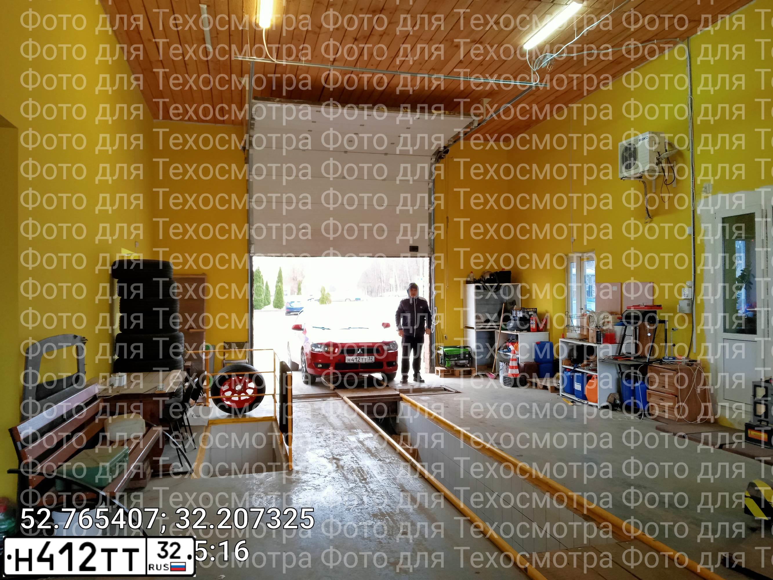 Фото автомобиля MITSUBISHI LANCER, 2008 — госномер Н412ТТ32. Цвет: Красный