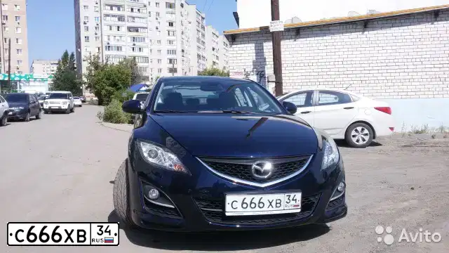 Фото автомобиля MITSUBISHI LANCER, 2007 — госномер О077ОУ64. Цвет: СЕРЫЙ