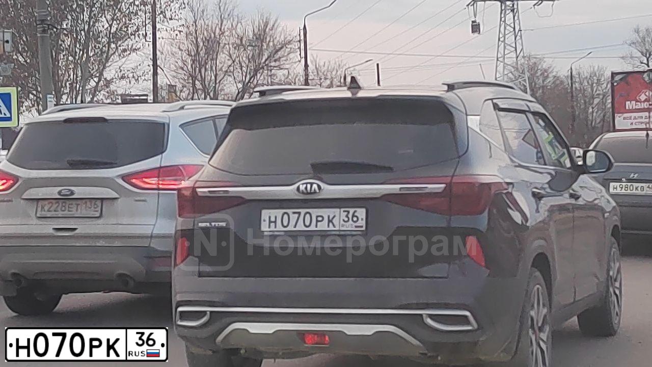 Фото автомобиля LADA 2107, 2009 — госномер Н070РК36. Цвет: ТЕМНО-ВИШНЕВЫЙ