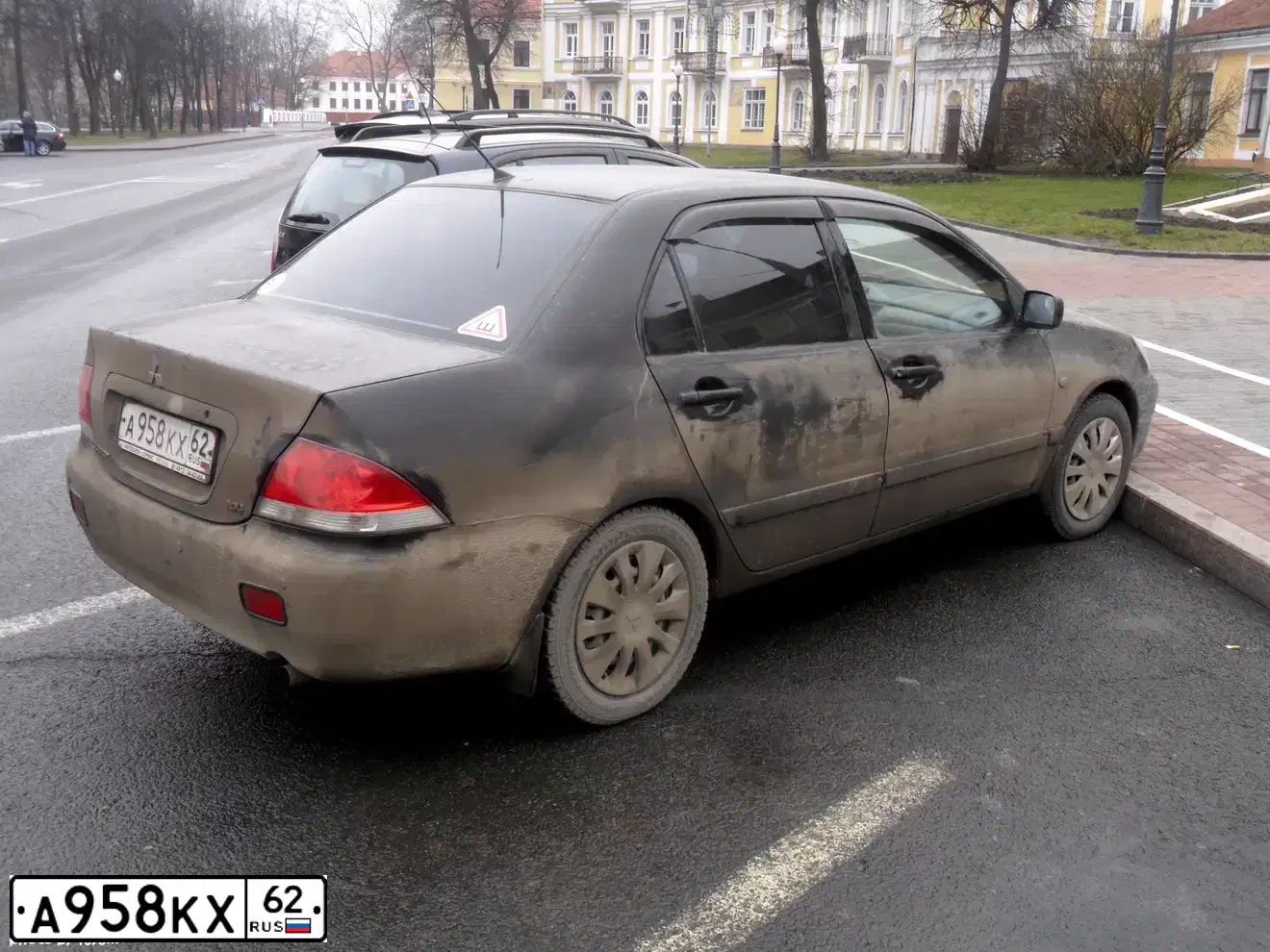 Фото автомобиля MITSUBISHI LANCER, 2007 — госномер А958КХ62. Цвет: ЧЕРНЫЙ