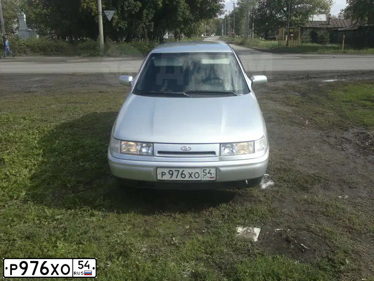 Фото автомобиля LADA 2112 LADA, 2003 — госномер Р976ХО54. Цвет: СВЕТЛО-СЕРЕБРИСТЫЙ МЕТАЛЛ