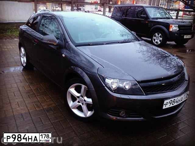 Фото автомобиля ОПЕЛЬ АСТРА GTC(A-H/C), 2010 — госномер Х345СМ797. Цвет: СЕРЫЙ ТЕМНЫЙ