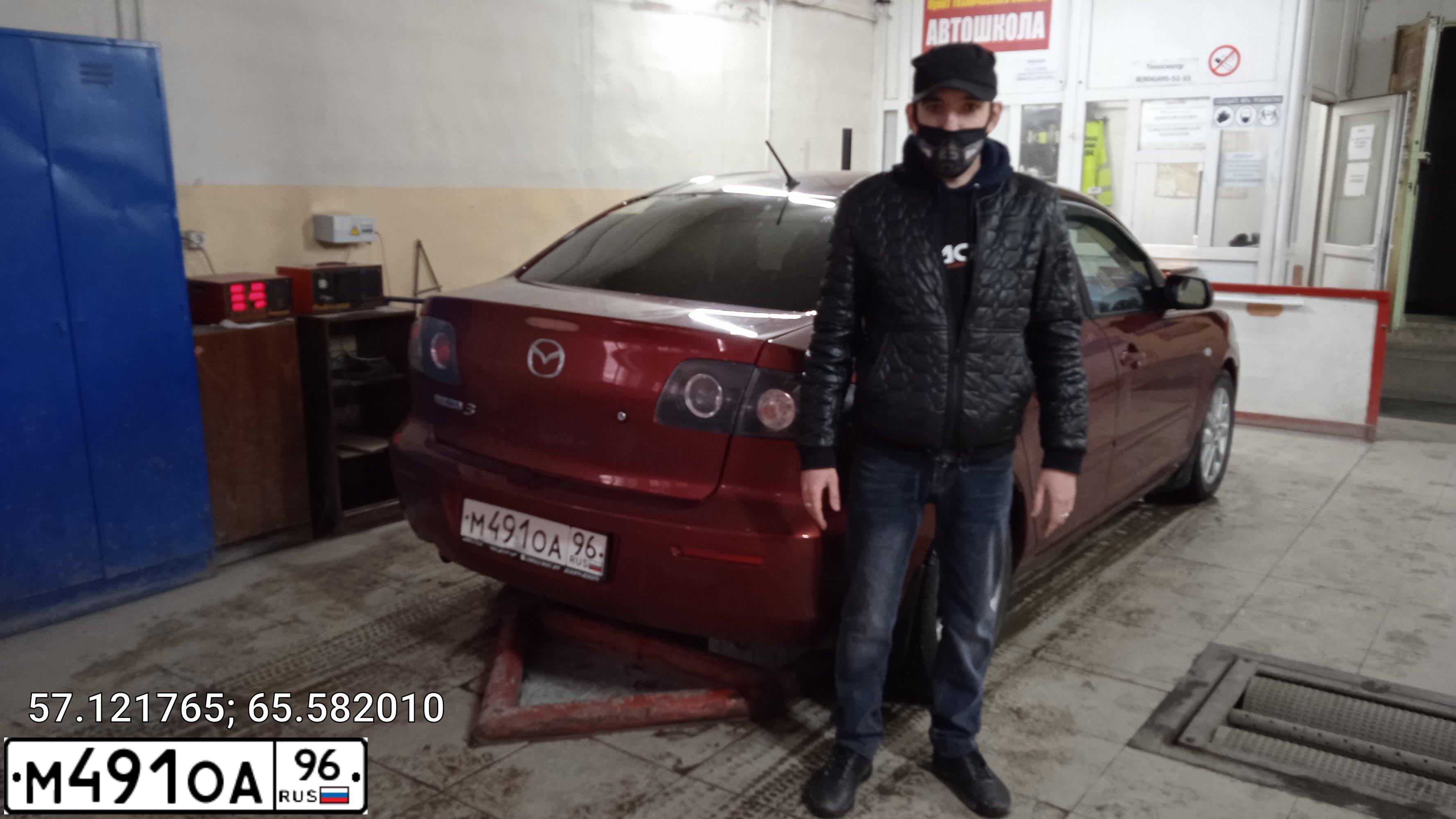 Фото автомобиля MAZDA 3, 2008 — госномер С823КХ72. Цвет: Красный