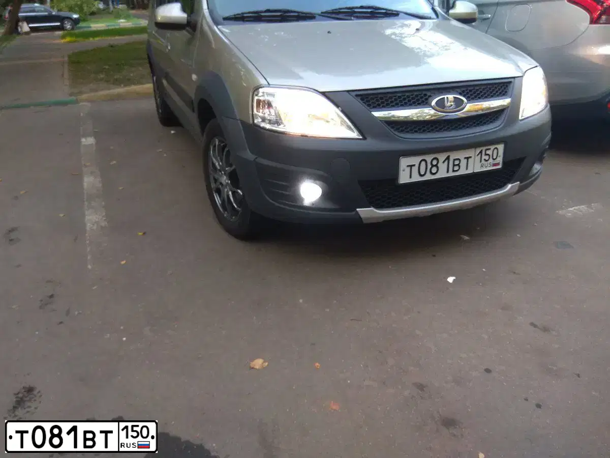 Фото автомобиля LADA LARGUS, 2017 — госномер О477МК71. Цвет: СЕРО-БЕЖЕВЫЙ