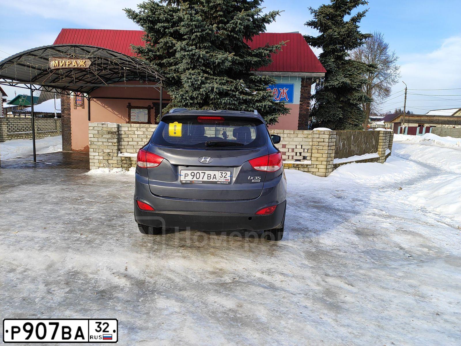 Фото автомобиля HYUNDAI IX35, 2010 — госномер Р907ВА32. Цвет: СЕРЫЙ ТЕМНЫЙ