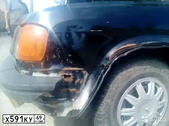 Фото автомобиля GAZ 3102 WOLGA, 1996 — госномер Х591КУ69. Цвет: ЧЕРНЫЙ