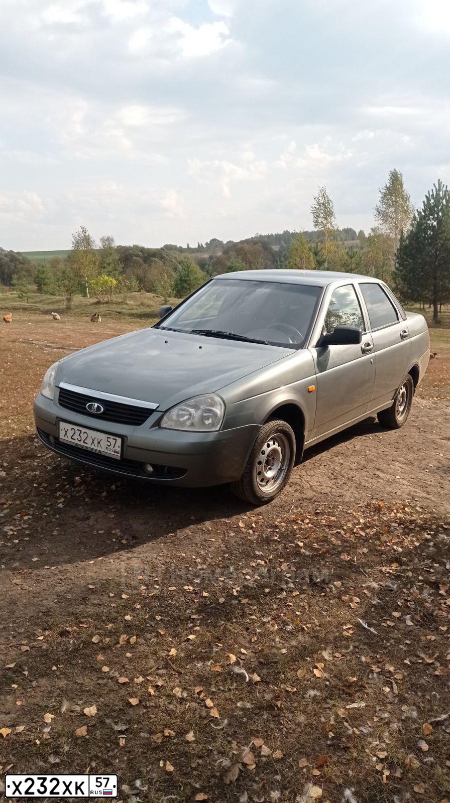 Фото автомобиля LADA 2170 PRIORA, 2009 — госномер Х232ХК57. Цвет: средний серо-зеленый металлик