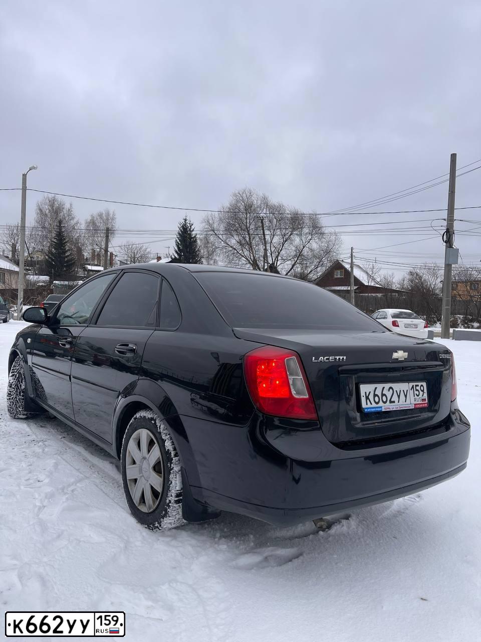 Фото автомобиля CHEVROLET LACETTI, 2008 — госномер К662УУ159. Цвет: ЧЕРНЫЙ