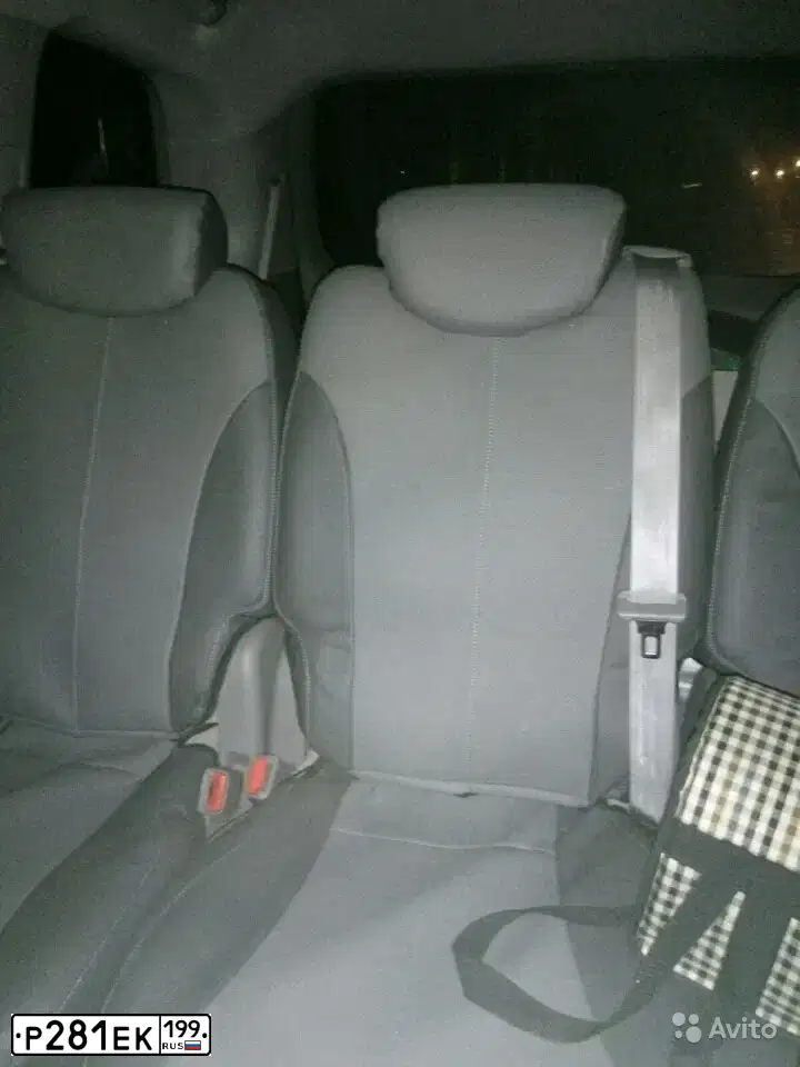 Фото автомобиля KIA CARNIVAL, 2008 — госномер Р281ЕК199. Цвет: ЧЕРНЫЙ
