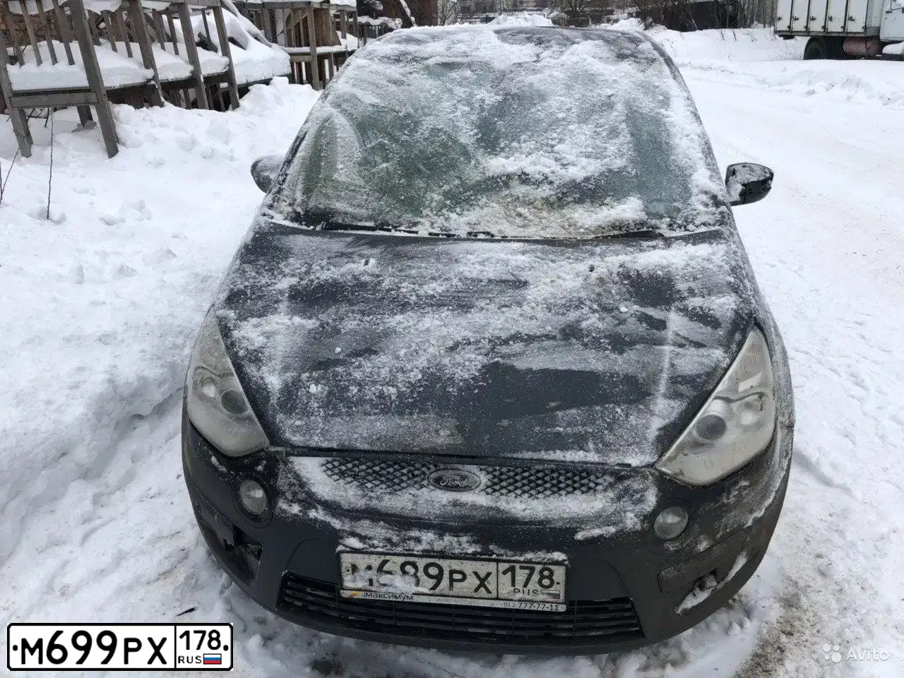 Фото автомобиля RENAULT SANDERO, 2012 — госномер М699РХ178. Цвет: ЧЕРНЫЙ