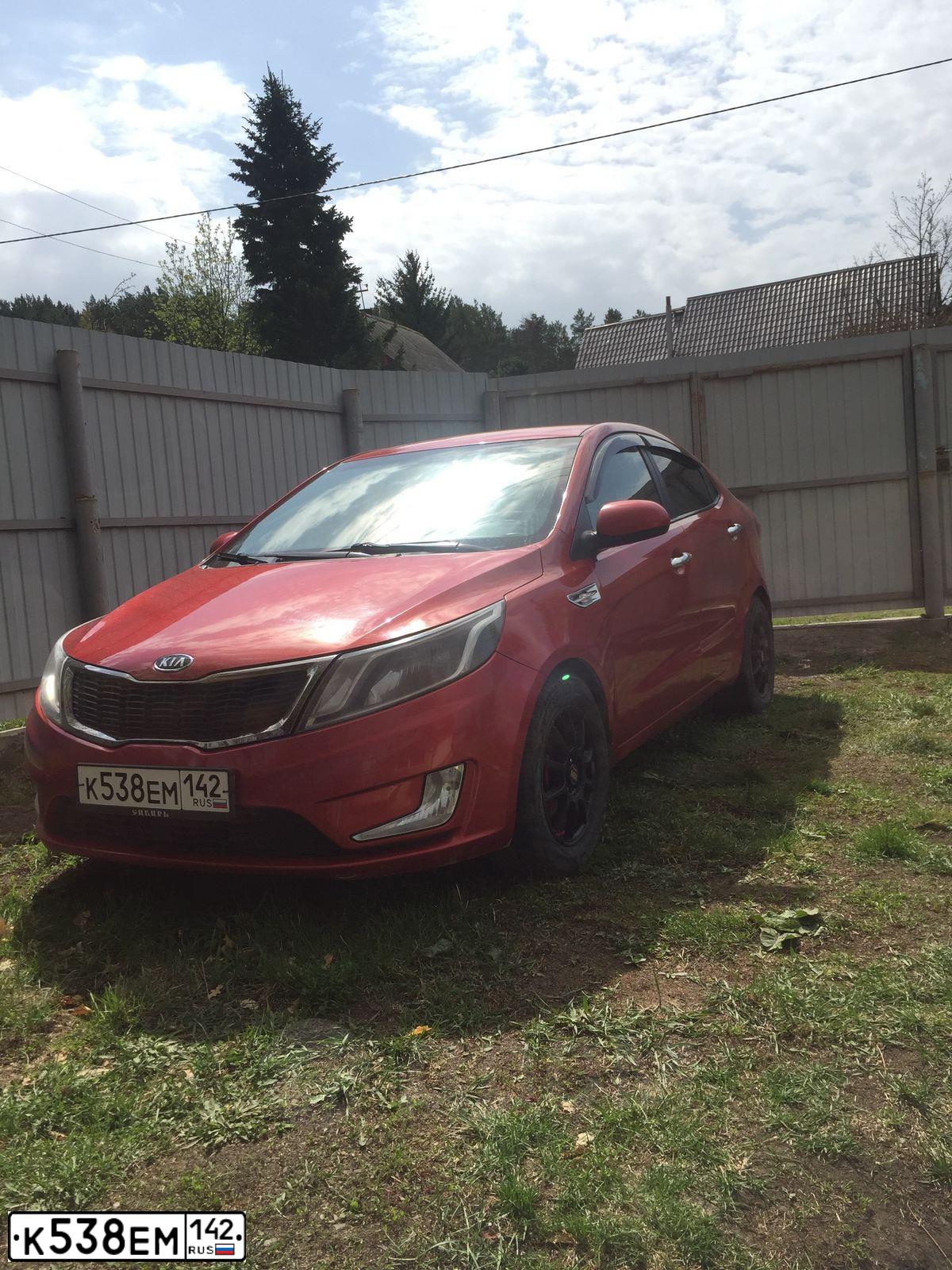 Фото автомобиля KIA RIO, 2011 — госномер А201МА19. Цвет: Красный