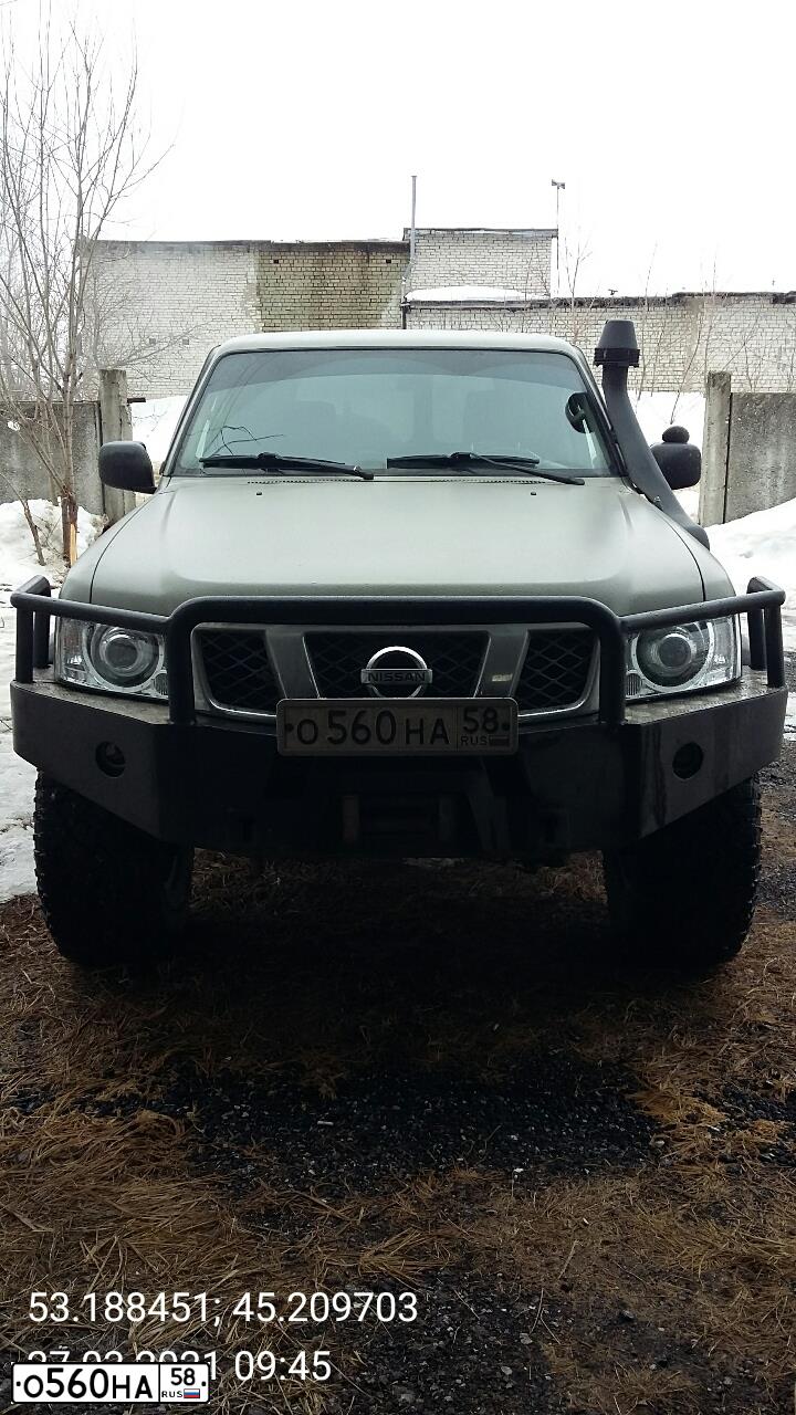 Фото автомобиля NISSAN PATROL, 2011 — госномер О560НА58. Цвет: СЕРО-БЕЖЕВЫЙ
