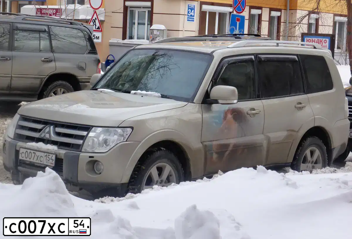 Фото автомобиля KAMAZ 55111 /6X4/, 2007 — госномер С007ХС54. Цвет: ОРАНЖЕВЫЙ