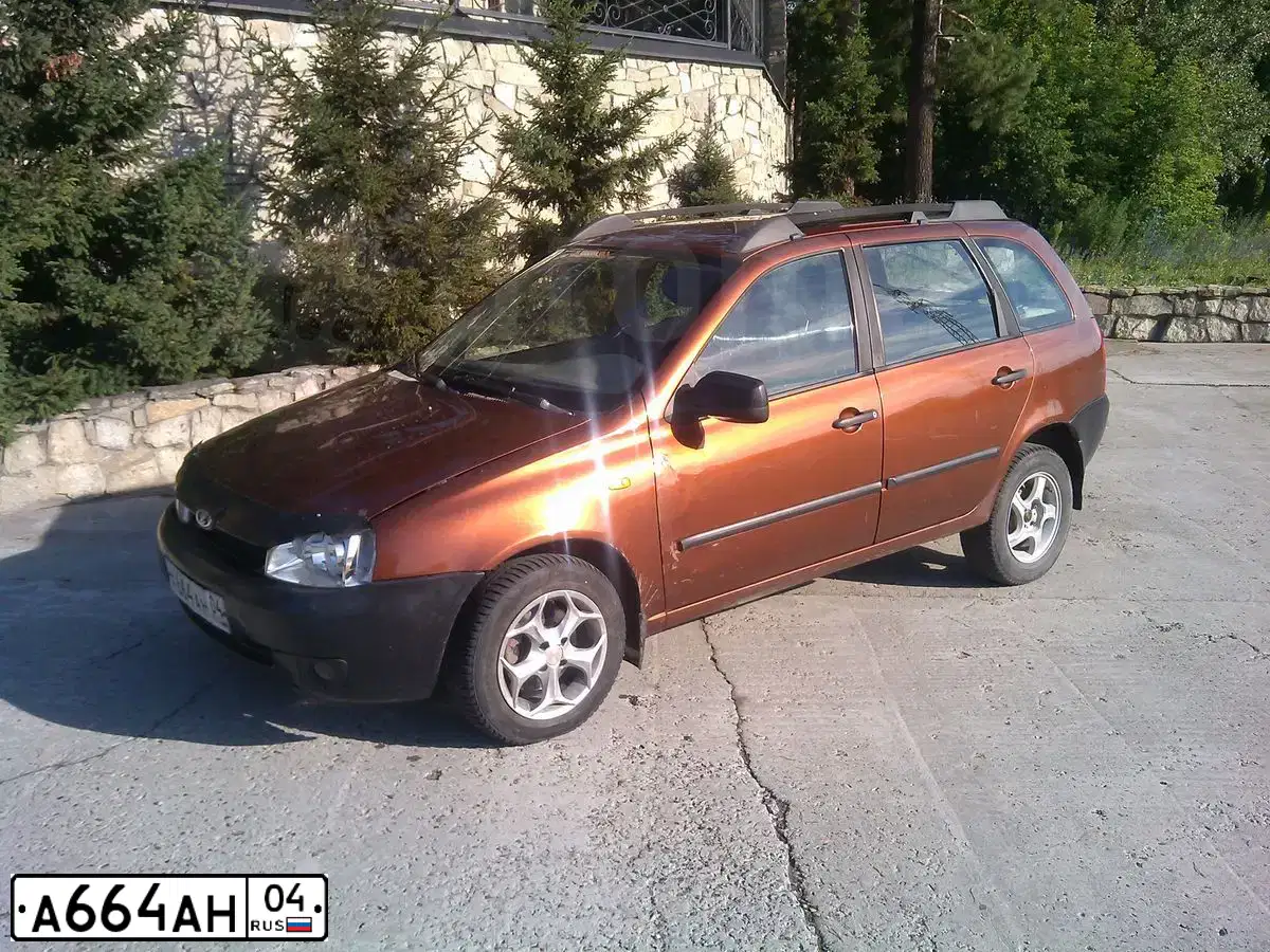 Фото автомобиля LADA 1117 KALINA, 2008 — госномер А664АН04. Цвет: ЖЕЛТО-КОРИЧНЕВЫЙ