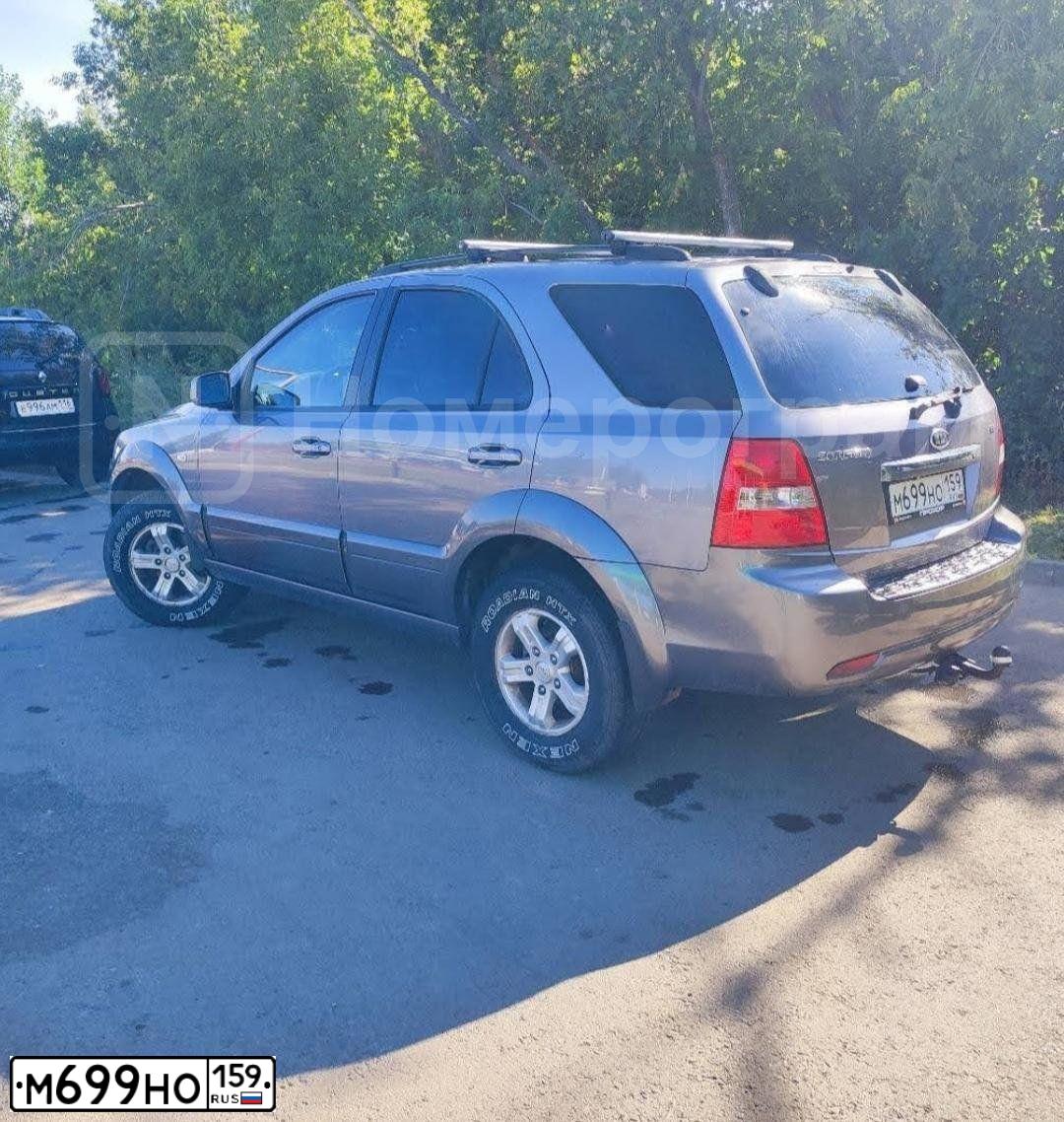 Фото автомобиля KIA SORENTO, 2007 — госномер В582ВВ159. Цвет: темно-серый