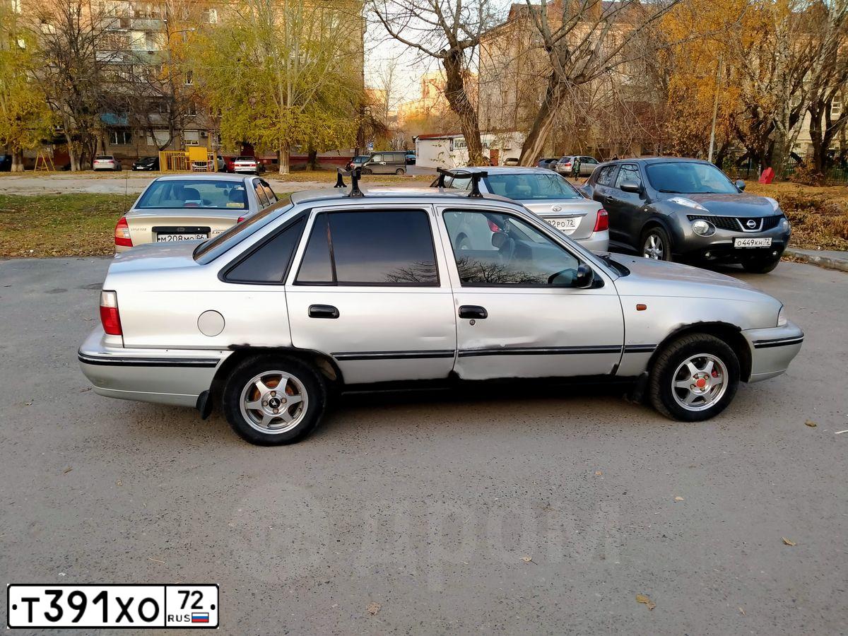 Фото автомобиля DAEWOO NEXIA, 2005 — госномер У786ХУ72. Цвет: СЕРО-СЕРЕБРИСТЫЙ