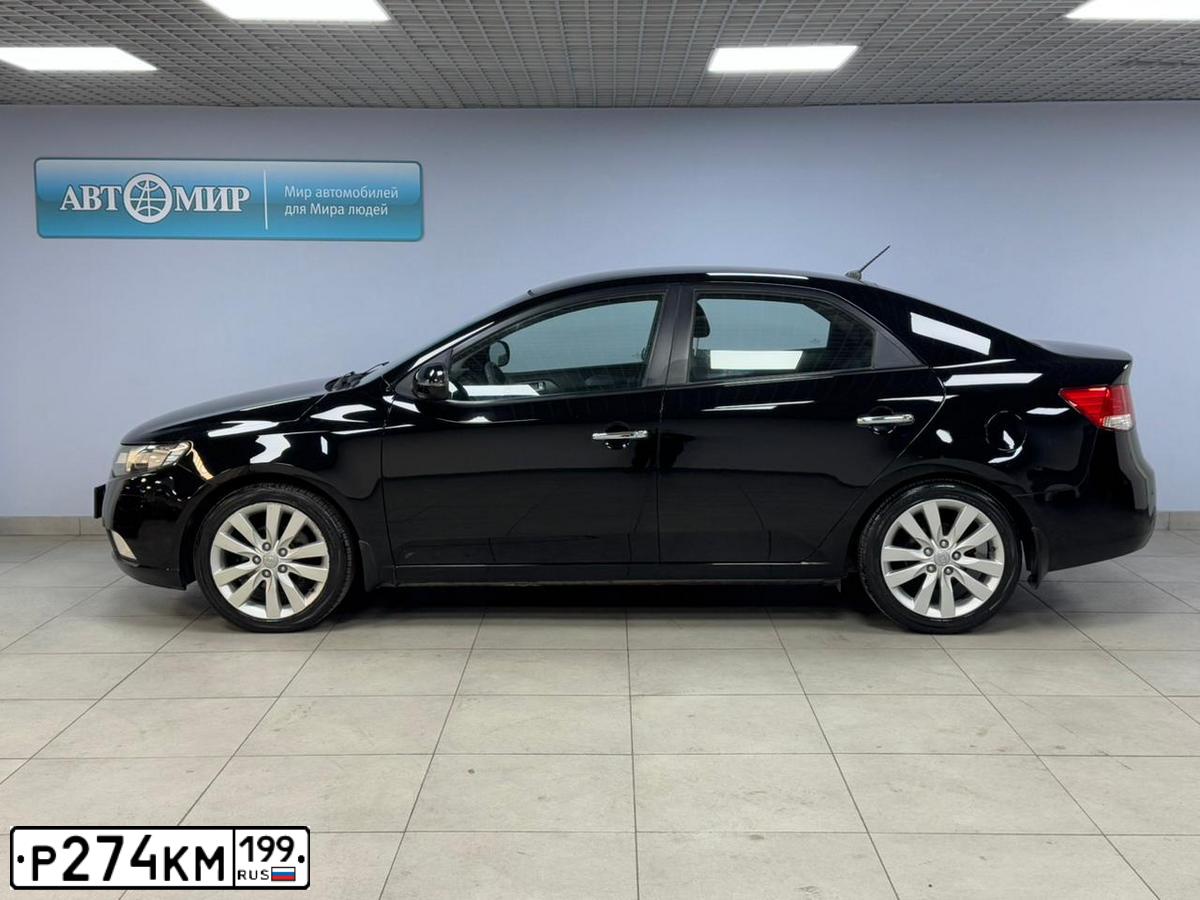 Фото автомобиля KIA CERATO, 2011 — госномер Р495УВ197. Цвет: ЧЕРНЫЙ