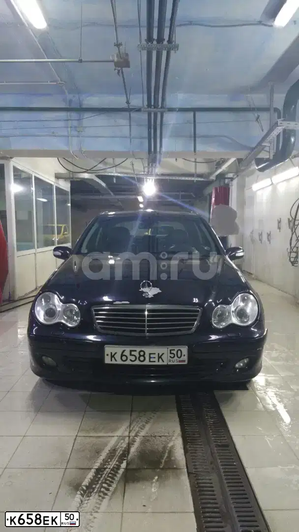 Фото автомобиля MERCEDES C-KLASSE, 2005 — госномер М335РС29. Цвет: ЧЕРНЫЙ