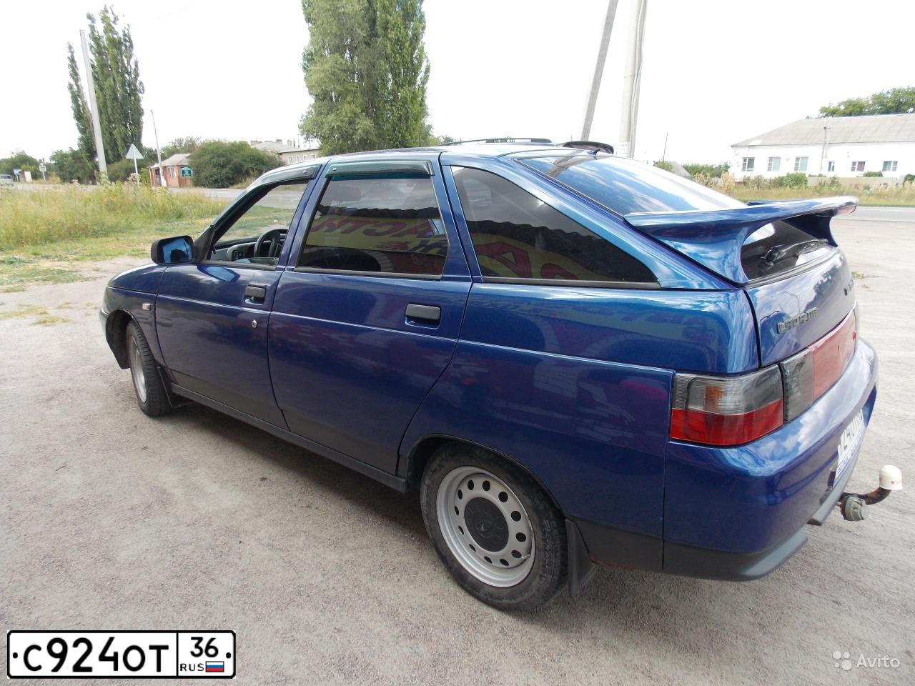 Фото автомобиля LADA 2112, 2003 — госномер К198РС126. Цвет: СЕРЕБРИСТО-ЧЕРНО СИНИЙ