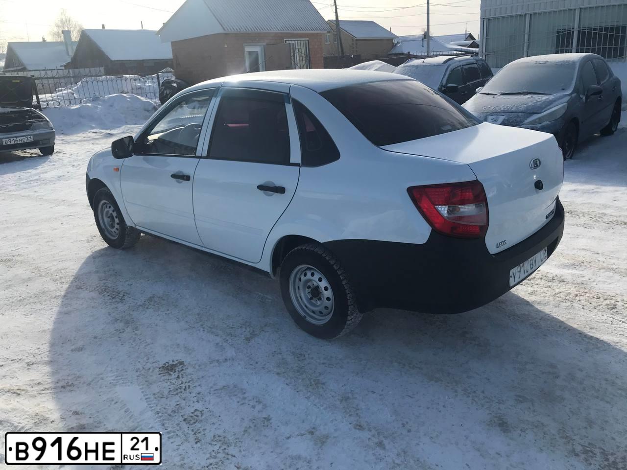Фото автомобиля KIA RIO, 2012 — госномер В926НЕ21. Цвет: СЕРЕБРИСТЫЙ