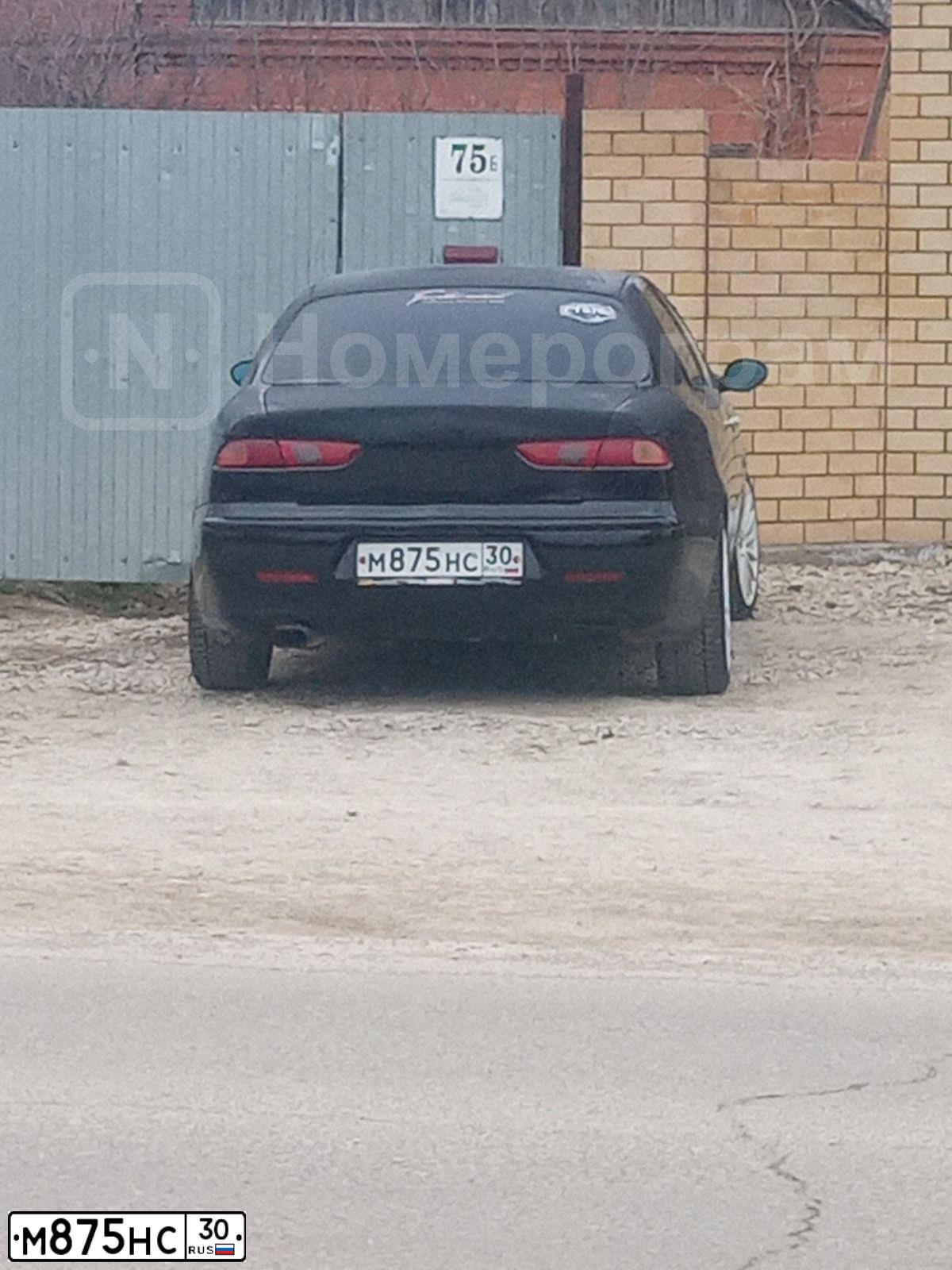 Фото автомобиля ALFAROMEO ALFA 156, 1998 — госномер М875НС30. Цвет: ЧЕРНЫЙ