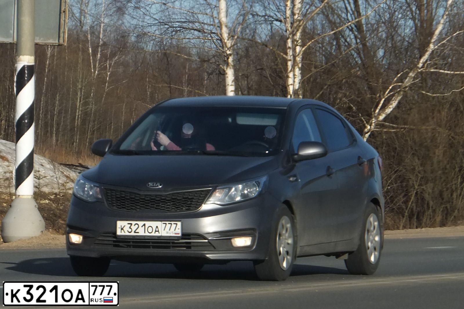 Фото автомобиля KIA RIO, 2015 — госномер К880СМ35. Цвет: СЕРЫЙ ТЕМНЫЙ