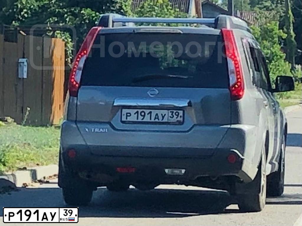 Фото автомобиля NISSAN X-TRAIL, 2011 — госномер Р191АУ39. Цвет: СЕРЫЙ
