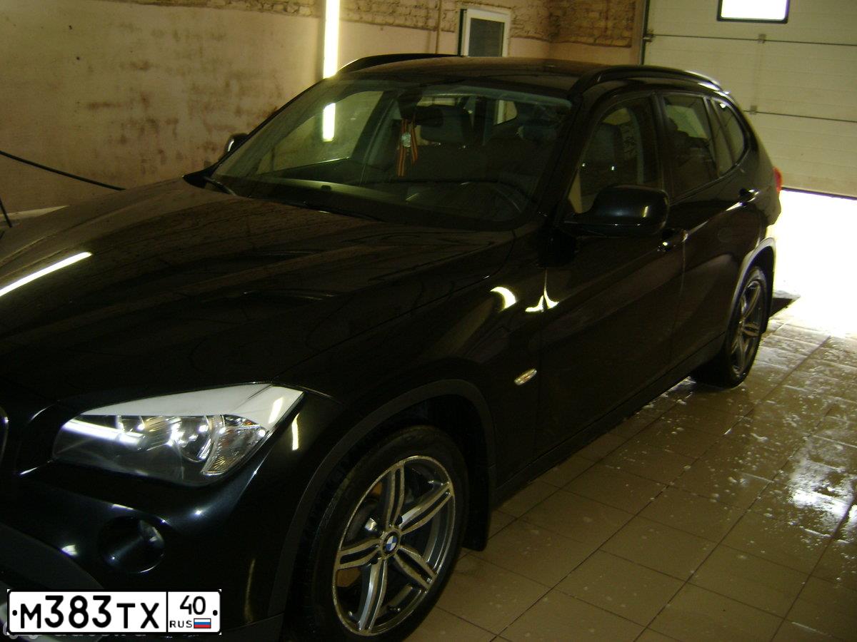 Фото автомобиля BMW X1, 2012 — госномер В200ВС136. Цвет: ЧЕРНЫЙ