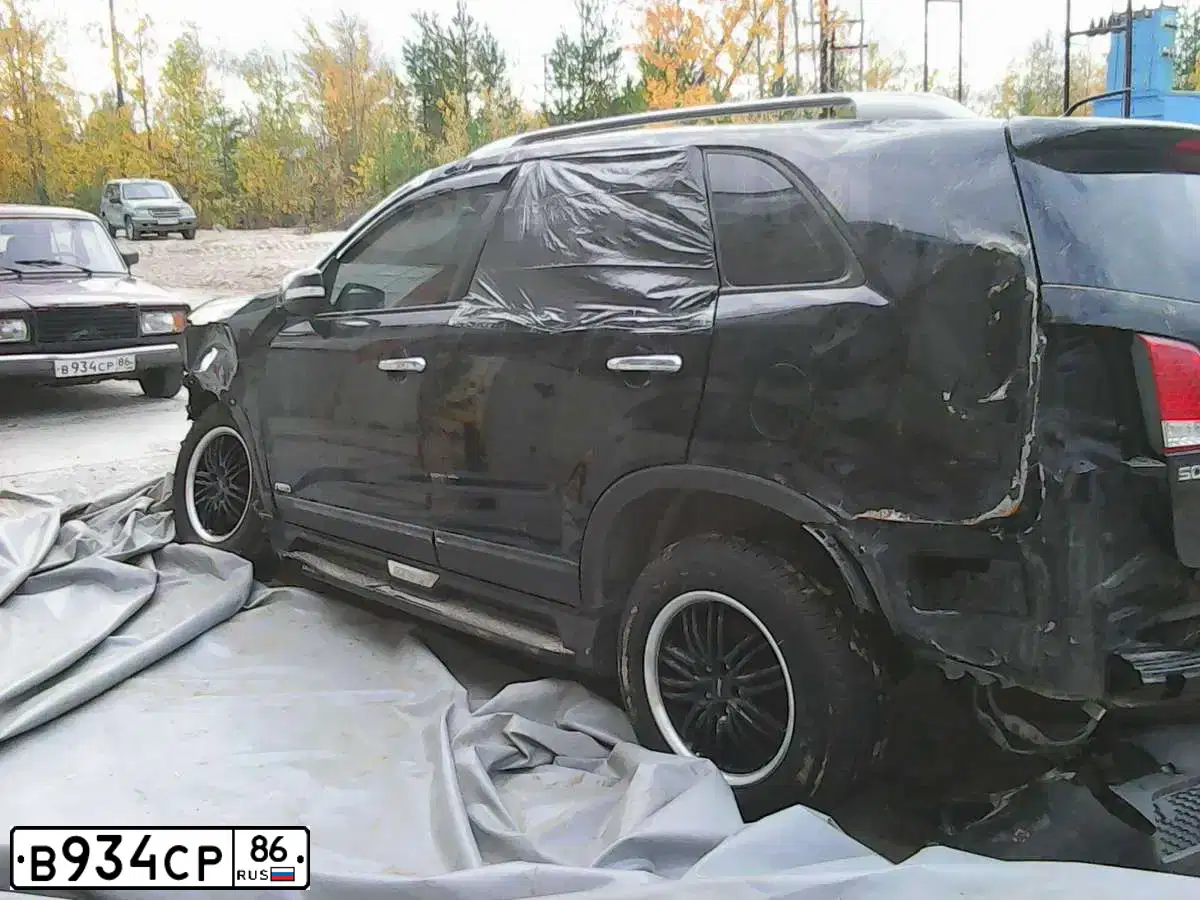 Фото автомобиля LADA 2107, 2005 — госномер В934СР86. Цвет: ТЕМНО-ВИШНЕВЫЙ