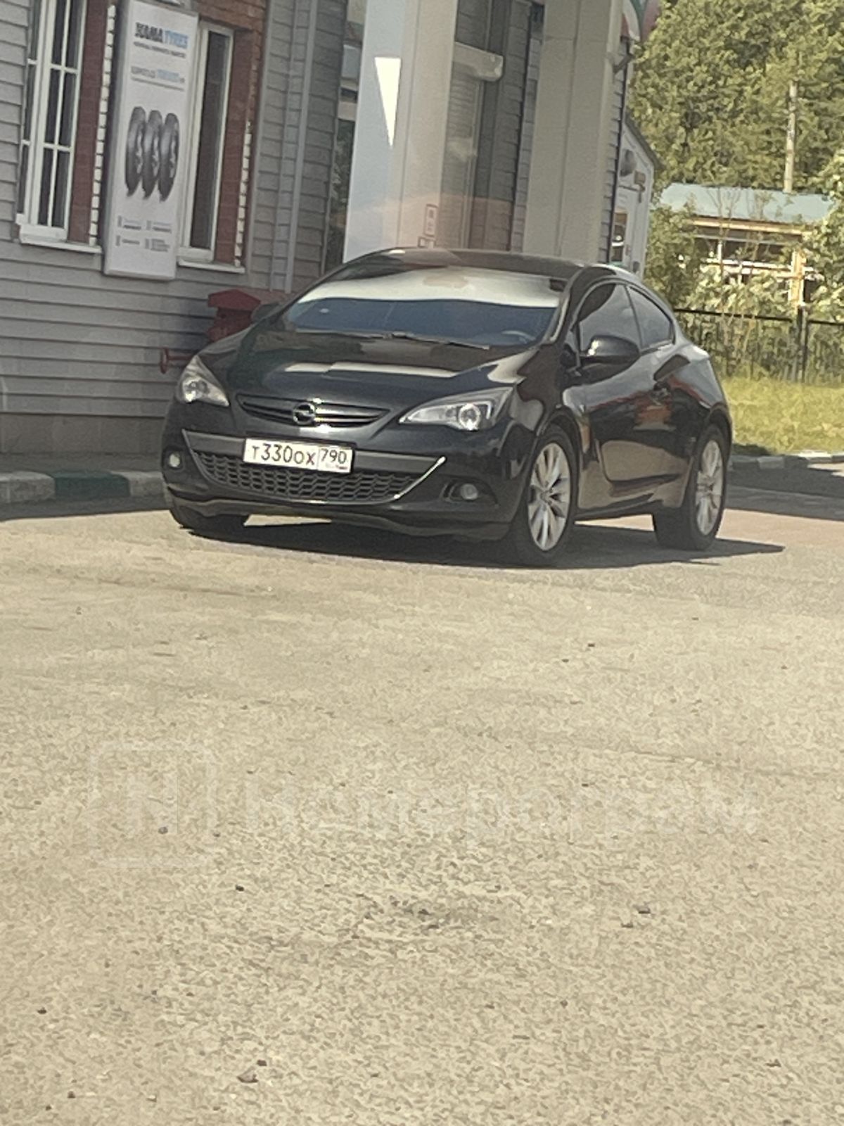 Фото автомобиля OPEL ASTRA, 2012 — госномер Т330ОХ790. Цвет: ЧЕРНЫЙ