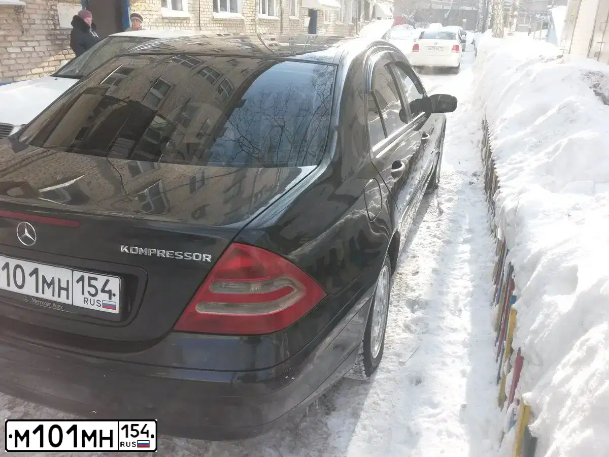 Фото автомобиля AUDI A6, 2011 — госномер М101МН154. Цвет: ЧЕРНЫЙ