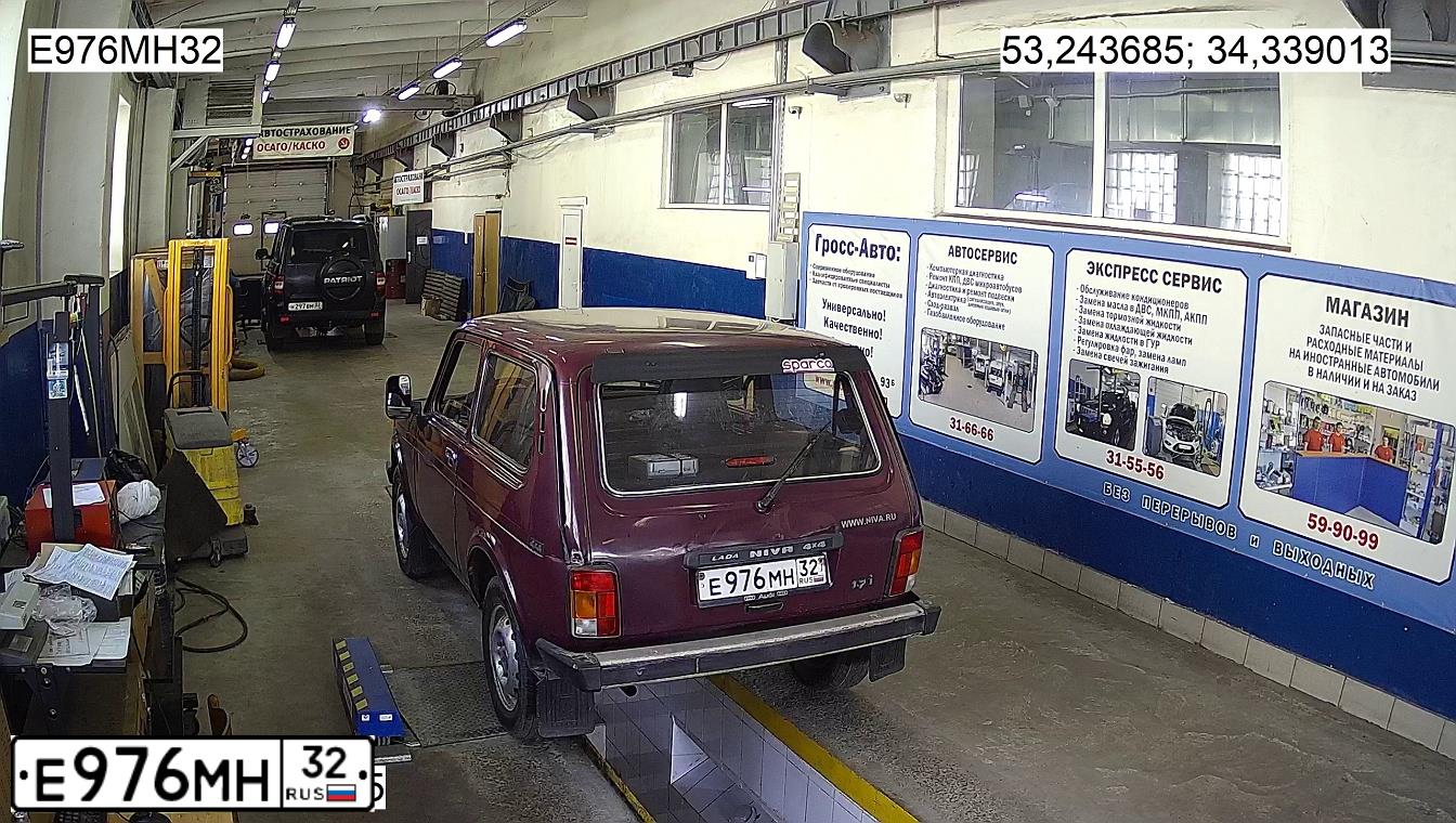 Фото автомобиля LADA 2121 NIVA, 2003 — госномер Е976МН32. Цвет: ТЕМНО-БОРДОВЫЙ