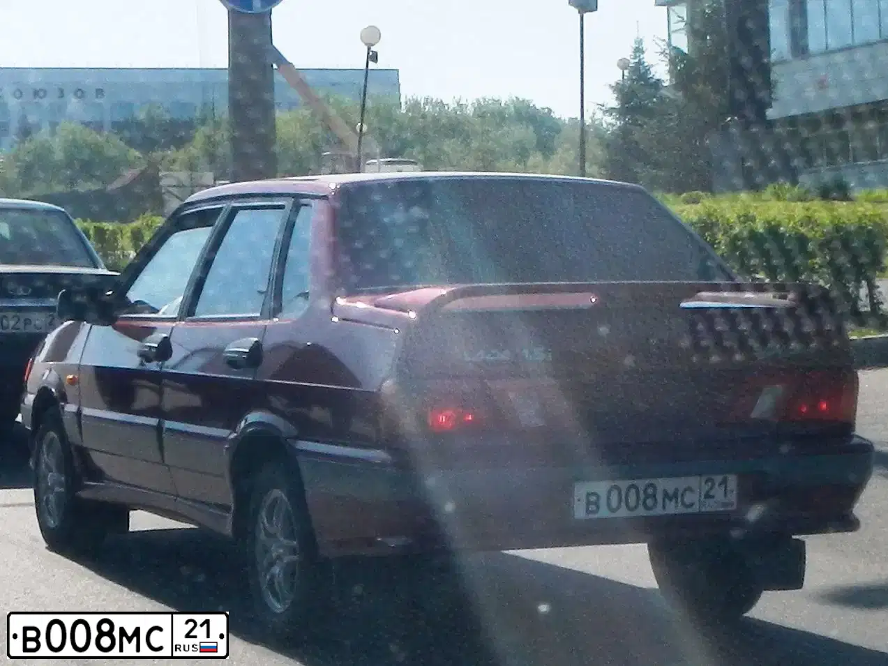 Фото автомобиля LADA 2115 SAMARA, 2002 — госномер К233СК21. Цвет: СЕРЕБРИСТЫЙ КРАСНЫЙ