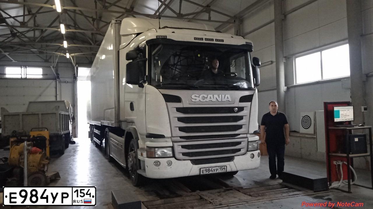 Фото автомобиля SCANIA SERIE G /4X2/, 2018 — госномер Е984УР154. Цвет: Белый