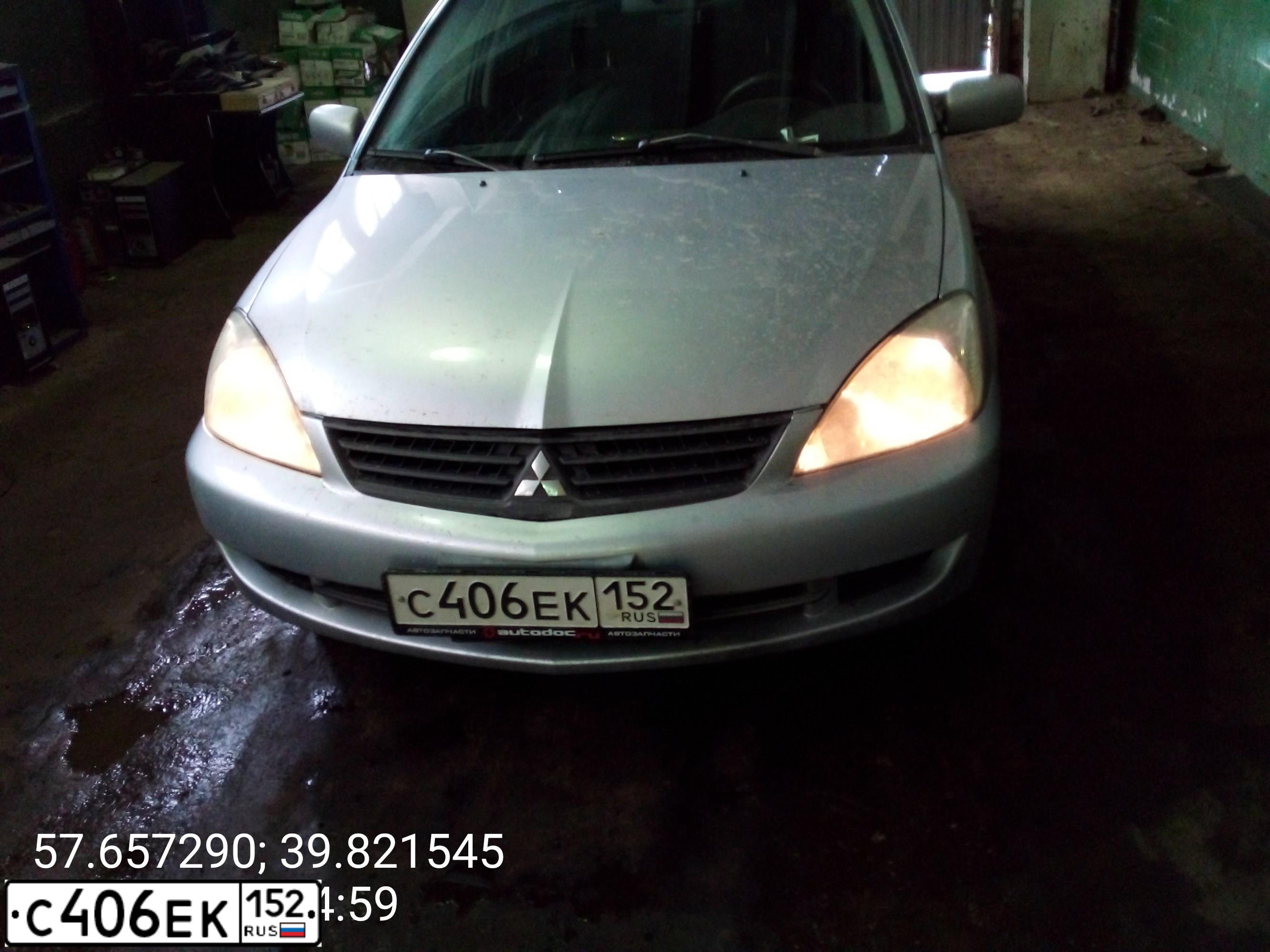 Фото автомобиля MITSUBISHI LANCER, 2006 — госномер К235МР76. Цвет: СЕРЫЙ