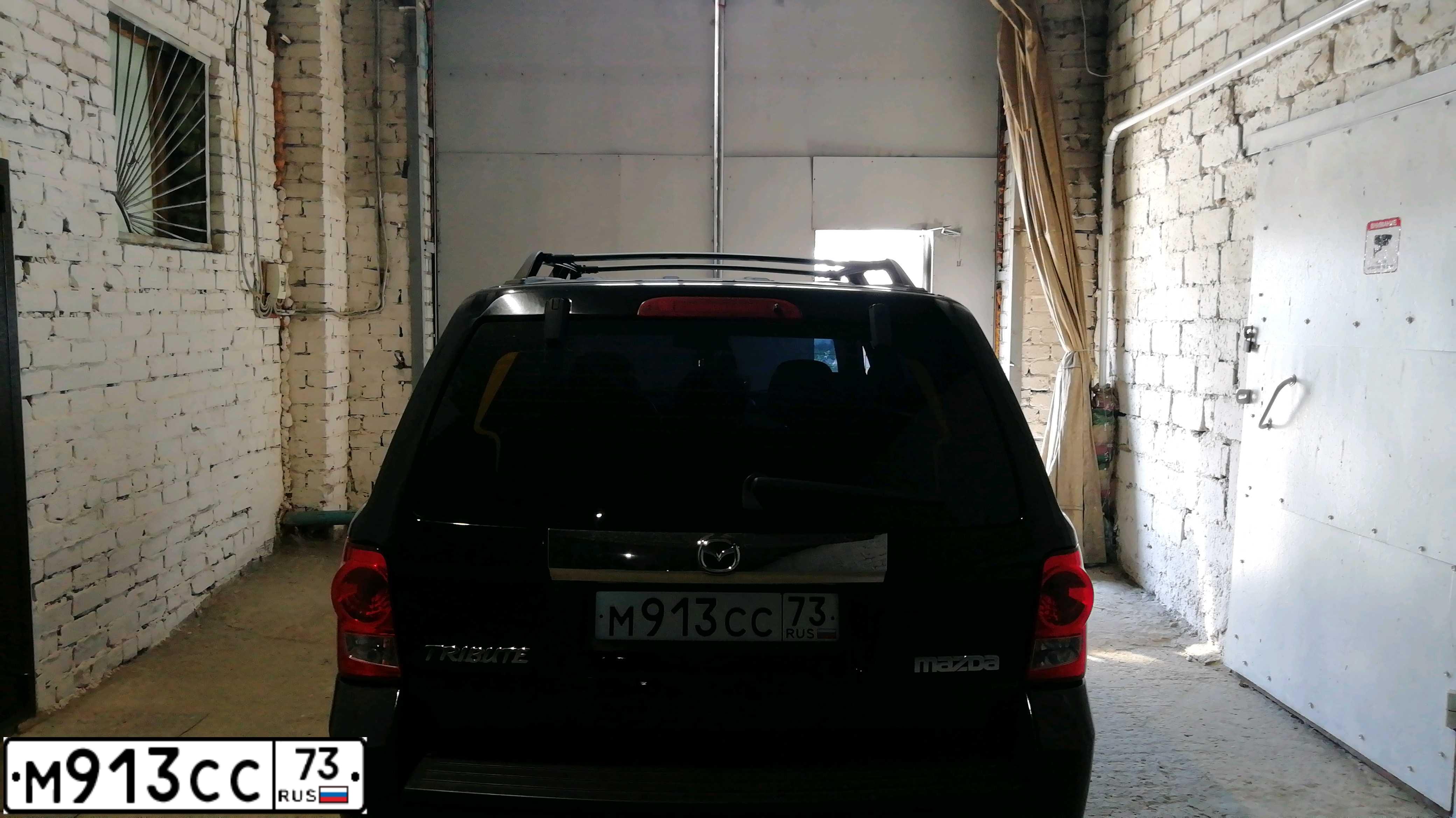 Фото автомобиля MAZDA TRIBUTE, 2007 — госномер Н815КО73. Цвет: ЧЕРНЫЙ