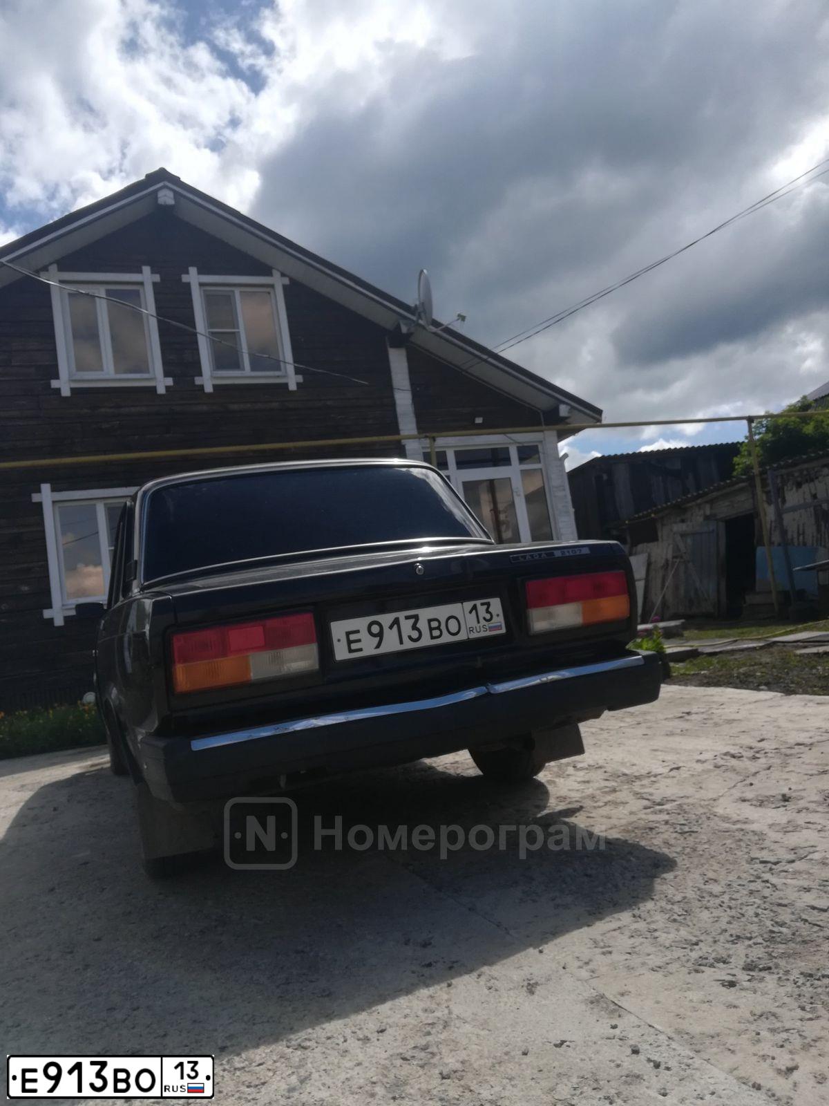 Фото автомобиля LADA 2107, 2009 — госномер Е913ВО13. Цвет: ТЕМНО-КОРИЧНЕВЫЙ