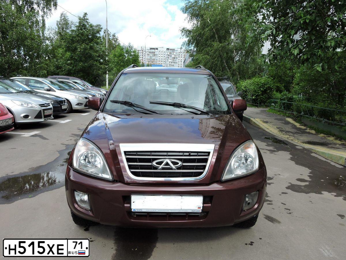 Фото автомобиля CHEVROLET AVEO, 2008 — госномер Н515ХЕ71. Цвет: ТЕМНО-КРАСНЫЙ