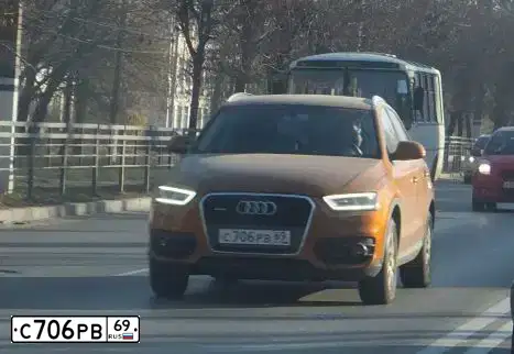 Фото автомобиля AUDI Q3, 2012 — госномер С706РВ69. Цвет: ОРАНЖЕВЫЙ