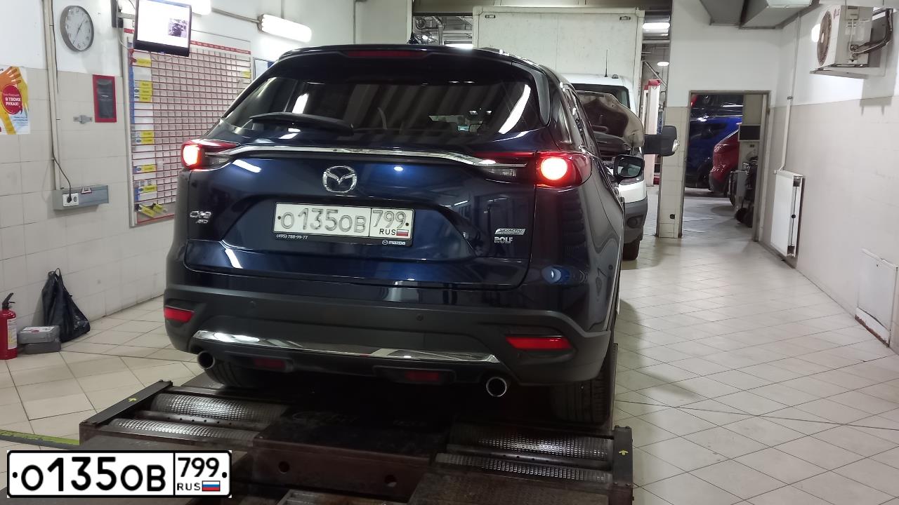 Фото автомобиля MAZDA CX-9, 2019 — госномер О135ОВ799. Цвет: СИНИЙ