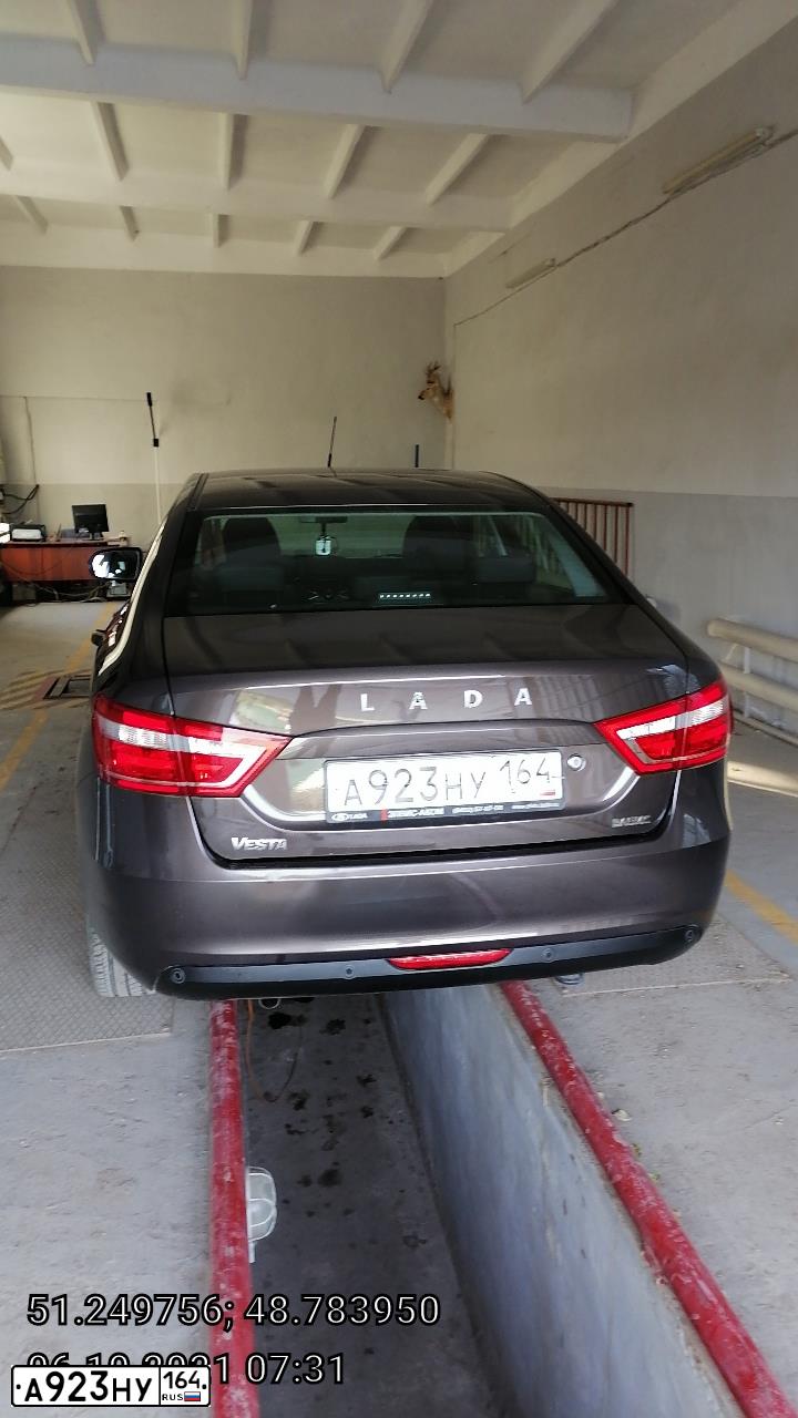 Фото автомобиля LADA VESTA, 2016 — госномер А923НУ164. Цвет: КОРИЧНЕВЫЙ