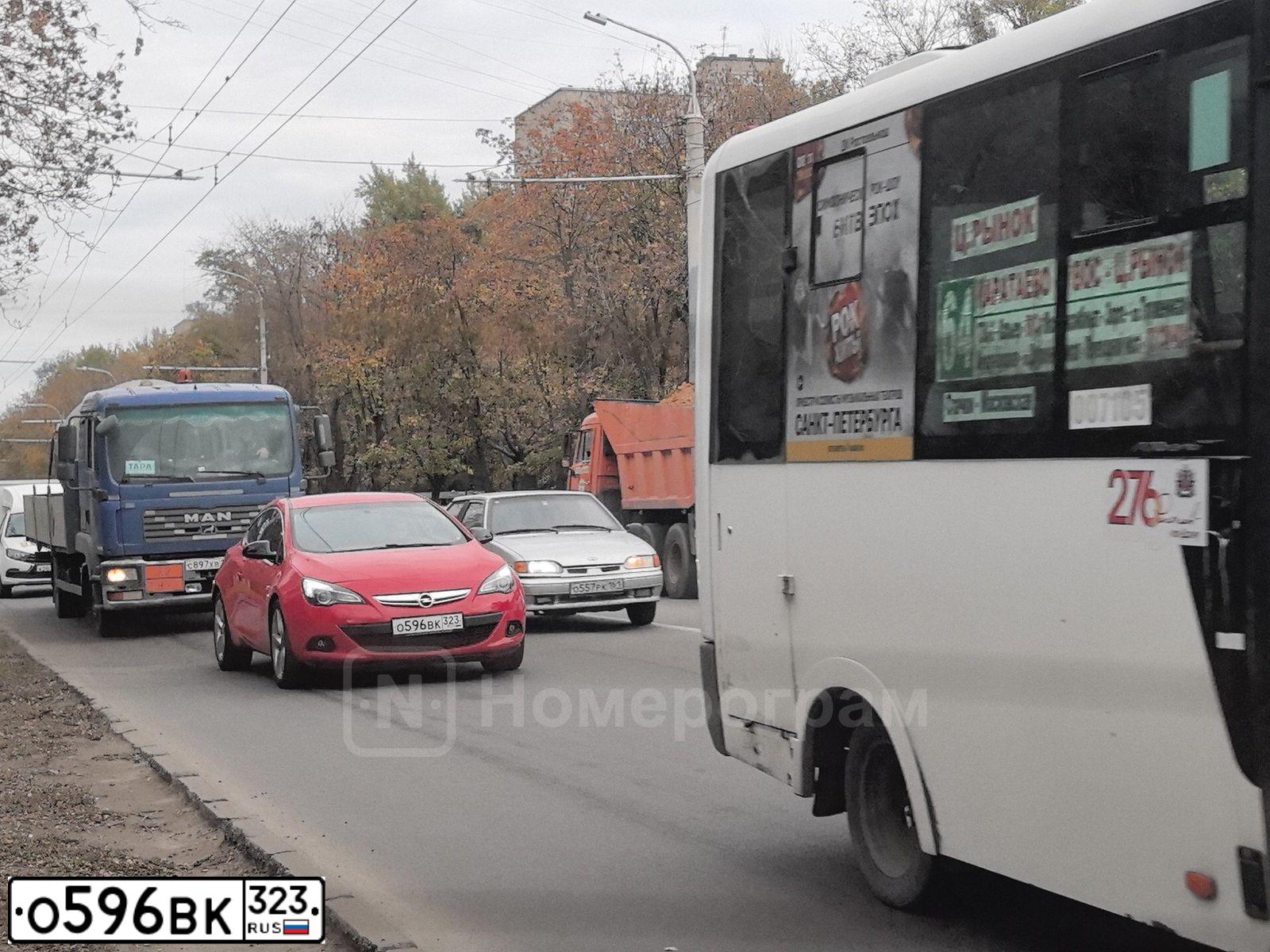 Фото автомобиля OPEL ASTRA, 2012 — госномер О596ВК323. Цвет: Красный
