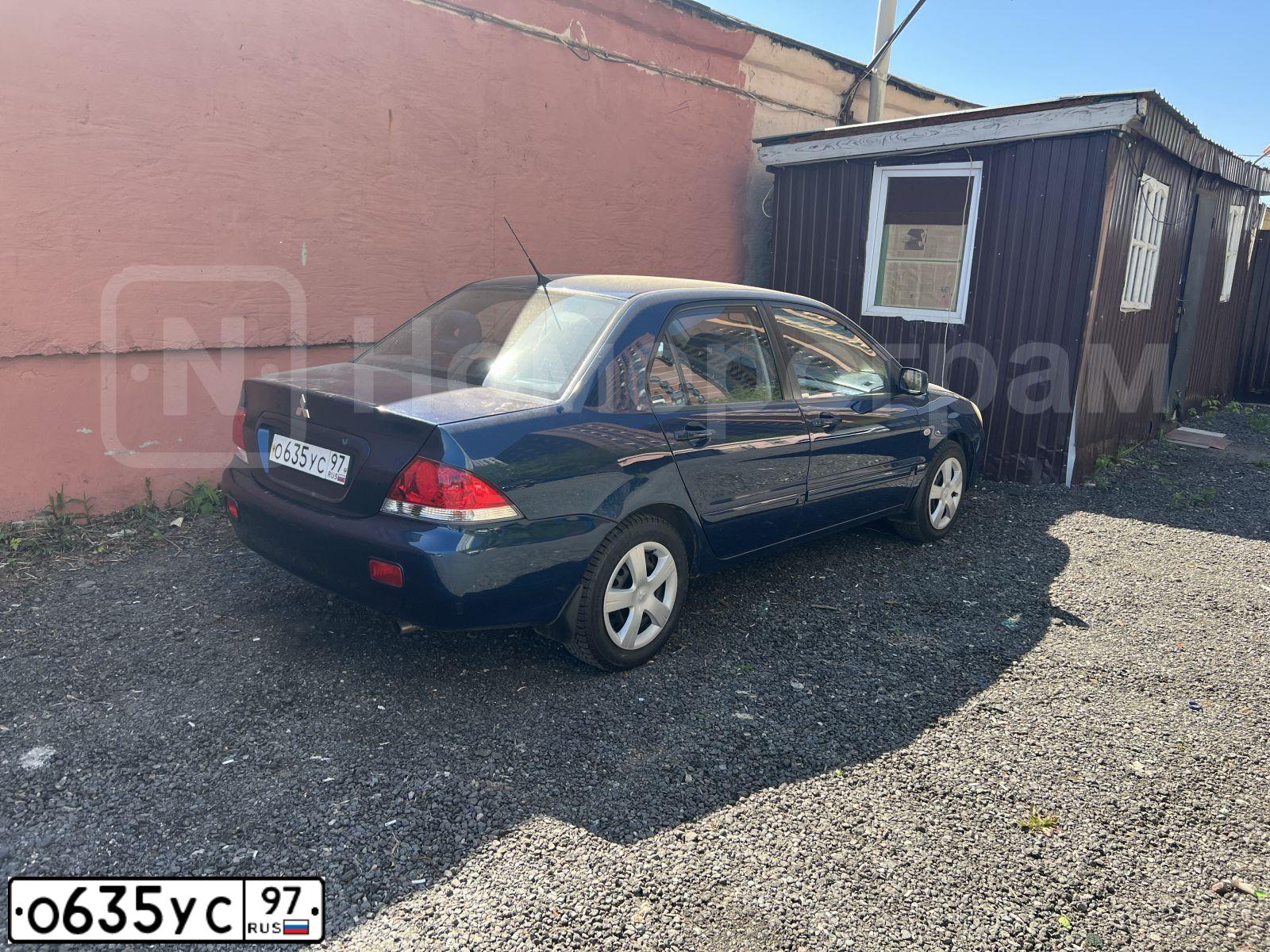 Фото автомобиля MITSUBISHI LANCER, 2005 — госномер Е911АТ250