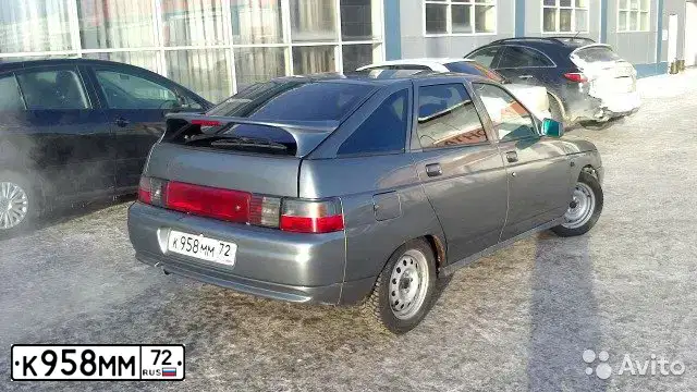 Фото автомобиля LADA 2112, 2005 — госномер К958ММ72. Цвет: КОМБИНИРОВАНЫЙ СЕРО-ЗЕЛЕНЫЙ-ЧЕРНЫЙ