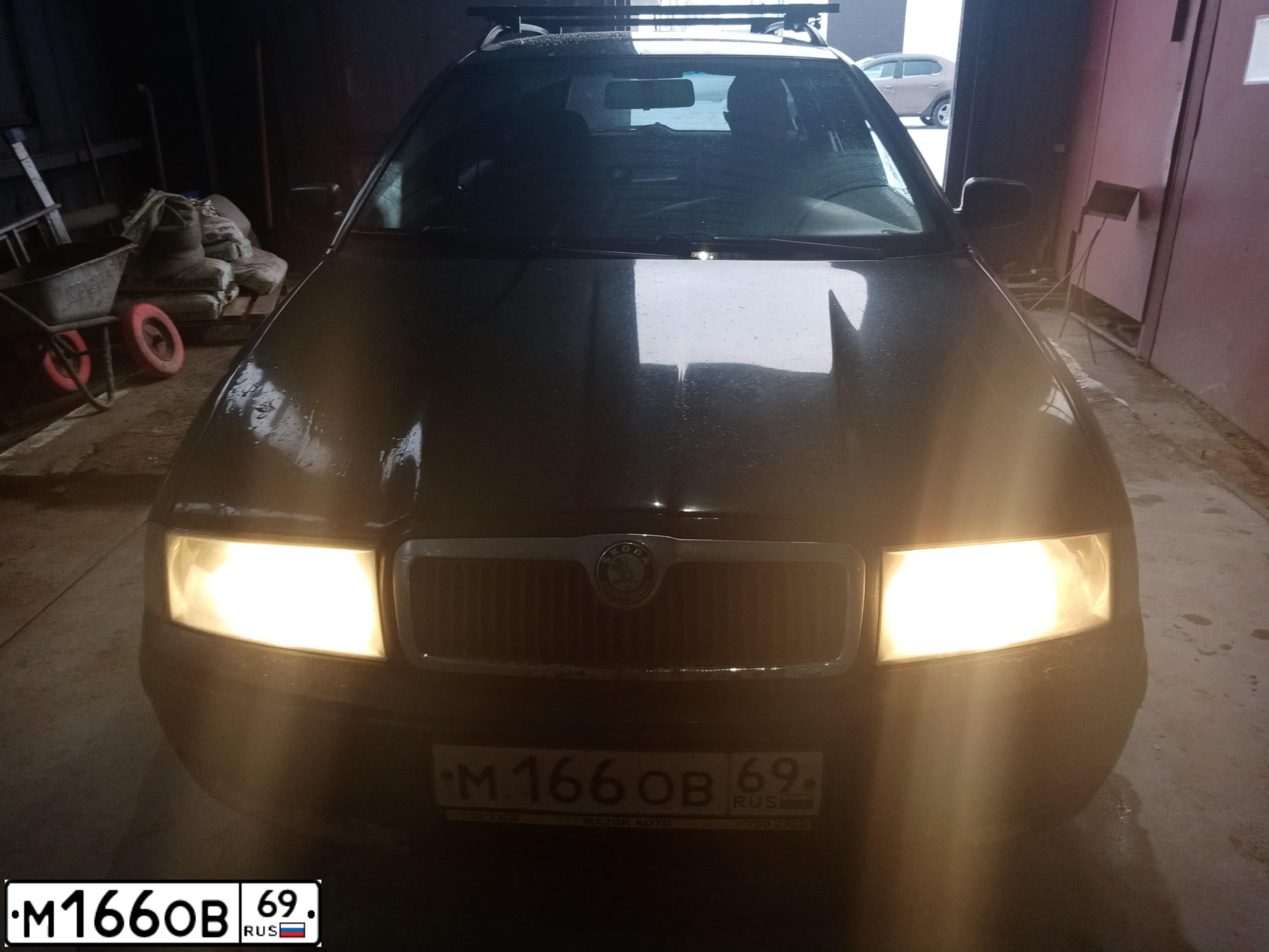 Фото автомобиля SKODA OCTAVIA, 2004 — госномер М166ОВ69. Цвет: Темно-зеленый