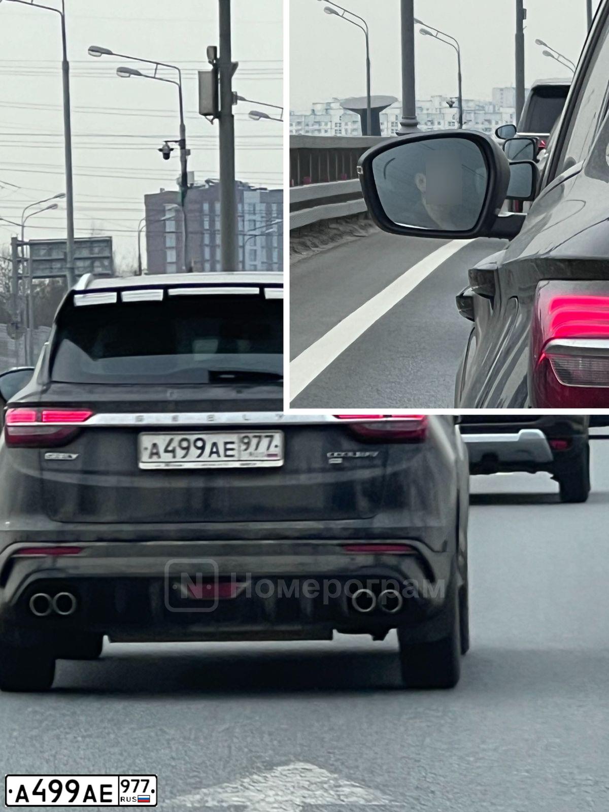 Фото автомобиля GEELY COOLRAY, 2022 — госномер А499АЕ977. Цвет: ЧЕРНЫЙ