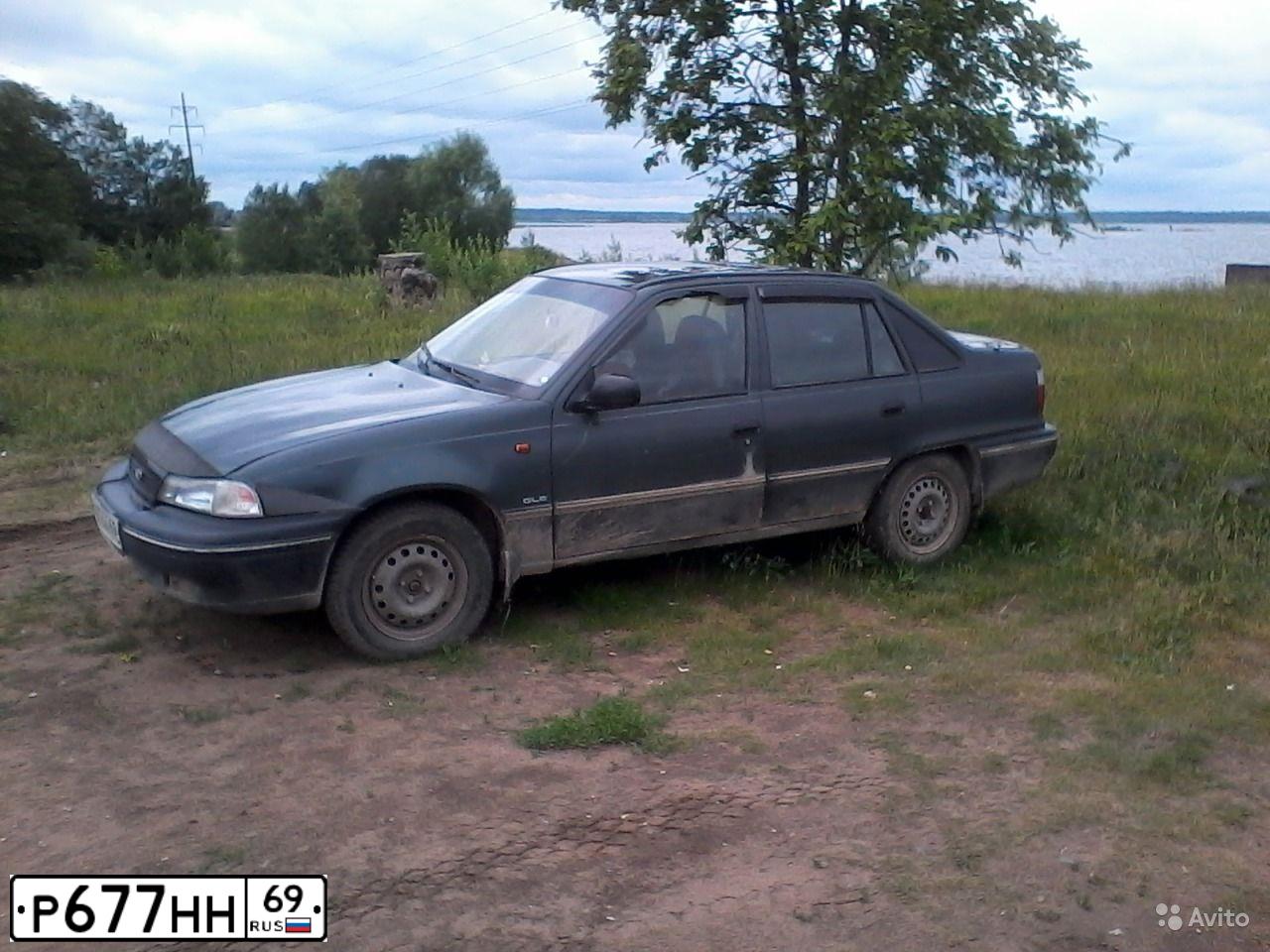 Фото автомобиля DAEWOO NEXIA, 2002 — госномер Н852КН69. Цвет: МАСЛИНОВЫЙ